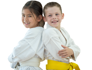 young girl and boy in karate uniforms